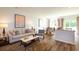 Bright and airy living room featuring modern decor, stylish furniture, and beautiful flooring at 160 Yarrow Way, Moncks Corner, SC 29461