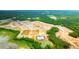 A scenic aerial view shows the community layout with newly constructed homes and green spaces at 166 Yarrow Way, Moncks Corner, SC 29461