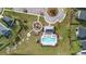 Aerial view of a pool, clubhouse, and playground in the community at 180 Basket Grass Ln, Summerville, SC 29486