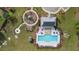 Overhead view showcasing the community pool, playground, fire pit, and various amenities at 180 Basket Grass Ln, Summerville, SC 29486