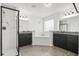 Bright bathroom featuring dual vanities, a separate shower, and a soaking tub for ultimate relaxation at 180 Basket Grass Ln, Summerville, SC 29486