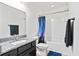 Bright bathroom with vanity, granite countertop, shower-tub combination with shower curtain at 180 Basket Grass Ln, Summerville, SC 29486