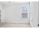 Bright bedroom with neutral carpet, large windows, and plenty of natural light at 180 Basket Grass Ln, Summerville, SC 29486