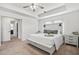 Serene main bedroom with trey ceiling, a cozy bed, and ensuite access, a peaceful retreat at 180 Basket Grass Ln, Summerville, SC 29486