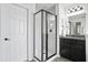 Modern bathroom shower featuring sleek glass doors, and stylish fixtures, perfect for a refreshing experience at 180 Basket Grass Ln, Summerville, SC 29486