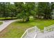 Expansive backyard view from the upper deck, showcasing the lush green lawn and mature trees at 187 Pecan Dr, Summerville, SC 29483