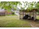 Spacious backyard with lawnmower in shed and lush lawn at 187 Pecan Dr, Summerville, SC 29483