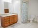 Bathroom featuring a vanity, shower with curtain, and neutral tile flooring at 187 Pecan Dr, Summerville, SC 29483
