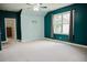 Bright bedroom featuring an open space, a ceiling fan and natural light from a large window at 187 Pecan Dr, Summerville, SC 29483