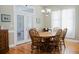 Dining room with hardwood flooring and access to outdoor patio at 187 Pecan Dr, Summerville, SC 29483