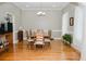 Bright dining room features hardwood floors, a chandelier, and plenty of natural light at 187 Pecan Dr, Summerville, SC 29483