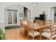 Elegant dining room with hardwood floors, a classic chandelier, and seating for eight at 187 Pecan Dr, Summerville, SC 29483