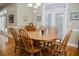 Spacious dining room with hardwood floors and large table perfect for entertaining at 187 Pecan Dr, Summerville, SC 29483