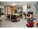 Functional garage featuring a workbench, tools, and ample storage solutions for DIY projects and organization at 187 Pecan Dr, Summerville, SC 29483