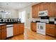 Bright kitchen featuring stainless steel appliances and ample cabinet space at 187 Pecan Dr, Summerville, SC 29483