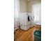Functional laundry room featuring modern, front-loading washer and dryer, and ample natural light at 187 Pecan Dr, Summerville, SC 29483