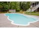 Refreshing outdoor pool surrounded by a concrete patio, ready for summer fun at 187 Pecan Dr, Summerville, SC 29483