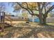 Large backyard with shed, firepit, and mature trees at 1925 Belgrade Ave, Charleston, SC 29407