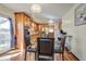 Eat-in kitchen with wood cabinetry, lots of lighting, and modern stainless appliances at 1925 Belgrade Ave, Charleston, SC 29407