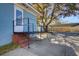 Ramped side entrance with storm door and carport at 1925 Belgrade Ave, Charleston, SC 29407