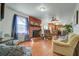 Cozy living room with a brick fireplace and comfortable seating arrangement at 1925 Belgrade Ave, Charleston, SC 29407