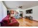 Spacious living room with hardwood floors and a comfortable seating arrangement at 1925 Belgrade Ave, Charleston, SC 29407