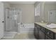 This bathroom features a tub, shower, and vanity at 1996 Wild Indigo Way, Hanahan, SC 29410