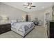 This bedroom features a plush bed, vanity, and ensuite bathroom at 1996 Wild Indigo Way, Hanahan, SC 29410