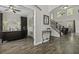 Inviting foyer leads to living areas with high ceilings and archways, flowing hardwood floors at 1996 Wild Indigo Way, Hanahan, SC 29410