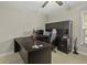 Office space with modern desk, office chair, neutral walls, and window views at 1996 Wild Indigo Way, Hanahan, SC 29410
