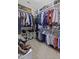The walk-in closet features custom shelves and racks for organization at 1996 Wild Indigo Way, Hanahan, SC 29410