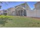 Backyard view showing patio and lush lawn at 2001 Poplar Grove Pl, Summerville, SC 29483