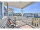 Relaxing balcony view with chairs, table, and view of the neighborhood at 2001 Poplar Grove Pl, Summerville, SC 29483
