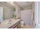 Well-lit bathroom with a clean vanity, mirror, and shower/tub combination at 2001 Poplar Grove Pl, Summerville, SC 29483