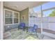 Enclosed porch with comfortable seating and view of private yard at 2001 Poplar Grove Pl, Summerville, SC 29483