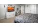 Comfortable bedroom with a large bed, soft carpet, and decorative wall art at 215 Sweet Cherry Ln, Summerville, SC 29486