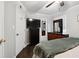 Another view of the bedroom featuring a ceiling fan, TV, dresser and natural light creating a restful ambiance at 2158 Till Rd, Charleston, SC 29414