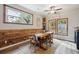 Dining room with farm-style table, rustic decor and natural lighting at 2158 Till Rd, Charleston, SC 29414