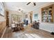 Farm-style dining area with natural light, wood accents and dining table at 2158 Till Rd, Charleston, SC 29414