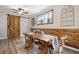 Bright dining area featuring a farm table with wood accent wall at 2158 Till Rd, Charleston, SC 29414