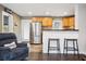 Well-lit kitchen featuring stainless steel refrigerator and a bar top with seating at 2158 Till Rd, Charleston, SC 29414