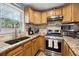 Kitchen boasting granite countertops, stainless appliances, and lots of storage at 2158 Till Rd, Charleston, SC 29414
