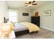 Bedroom with a queen-sized bed, dark wood accents, and decorative wall art at 2160 Pentland Dr, Charleston, SC 29412