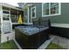 Backyard patio with hot tub and view of the screened porch at 2160 Pentland Dr, Charleston, SC 29412