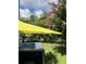 Hot tub with yellow umbrella and beautiful backyard at 2160 Pentland Dr, Charleston, SC 29412