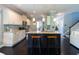 Open kitchen with granite island and stainless appliances and breakfast bar at 2160 Pentland Dr, Charleston, SC 29412