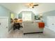 Comfortable living room has a sofa, television, and a bright window at 2160 Pentland Dr, Charleston, SC 29412