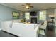 Comfortable living room featuring a fireplace, large sofa, and ample natural light at 2160 Pentland Dr, Charleston, SC 29412