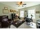 Office space with a large desk, comfortable chair, and two bright windows at 2160 Pentland Dr, Charleston, SC 29412