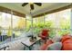 Inviting screened porch with comfortable seating and view of hot tub at 2160 Pentland Dr, Charleston, SC 29412